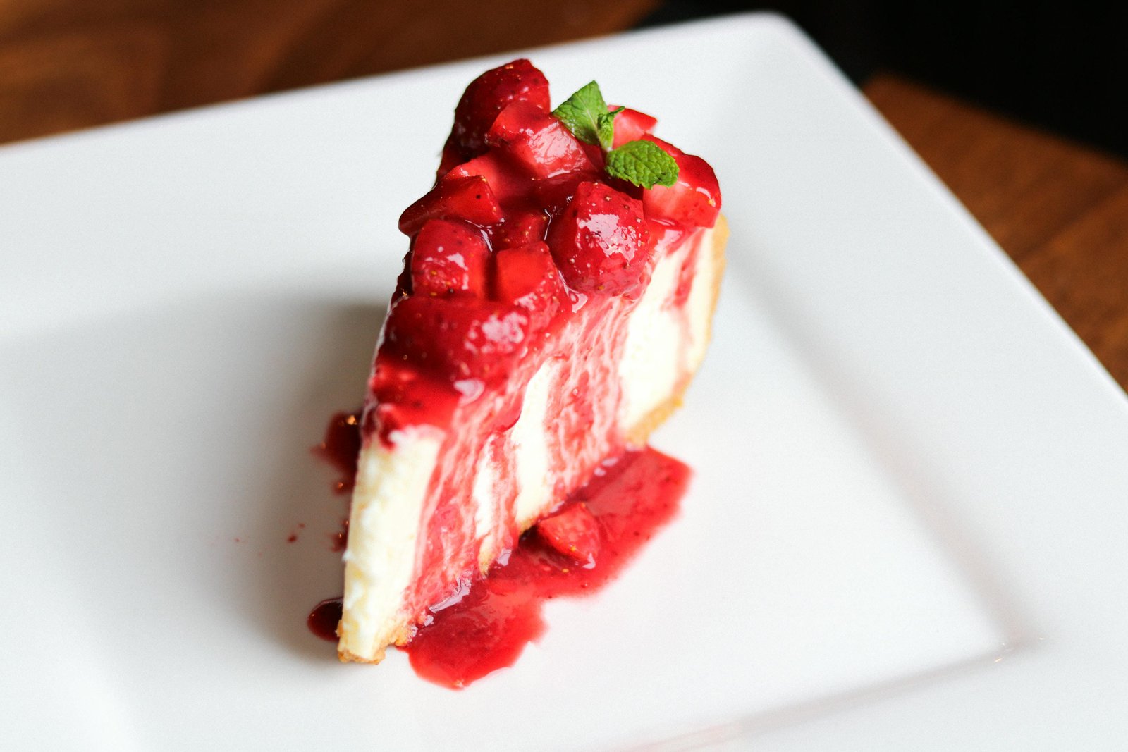New York cheesecake with strawberry sauce and fresh berries at Tequila Fuego Longview
