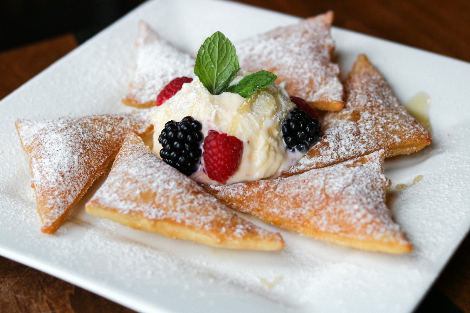 Sopapillas with powdered sugar, fresh berries and vanilla ice cream at Tequila Fuego Longview WA