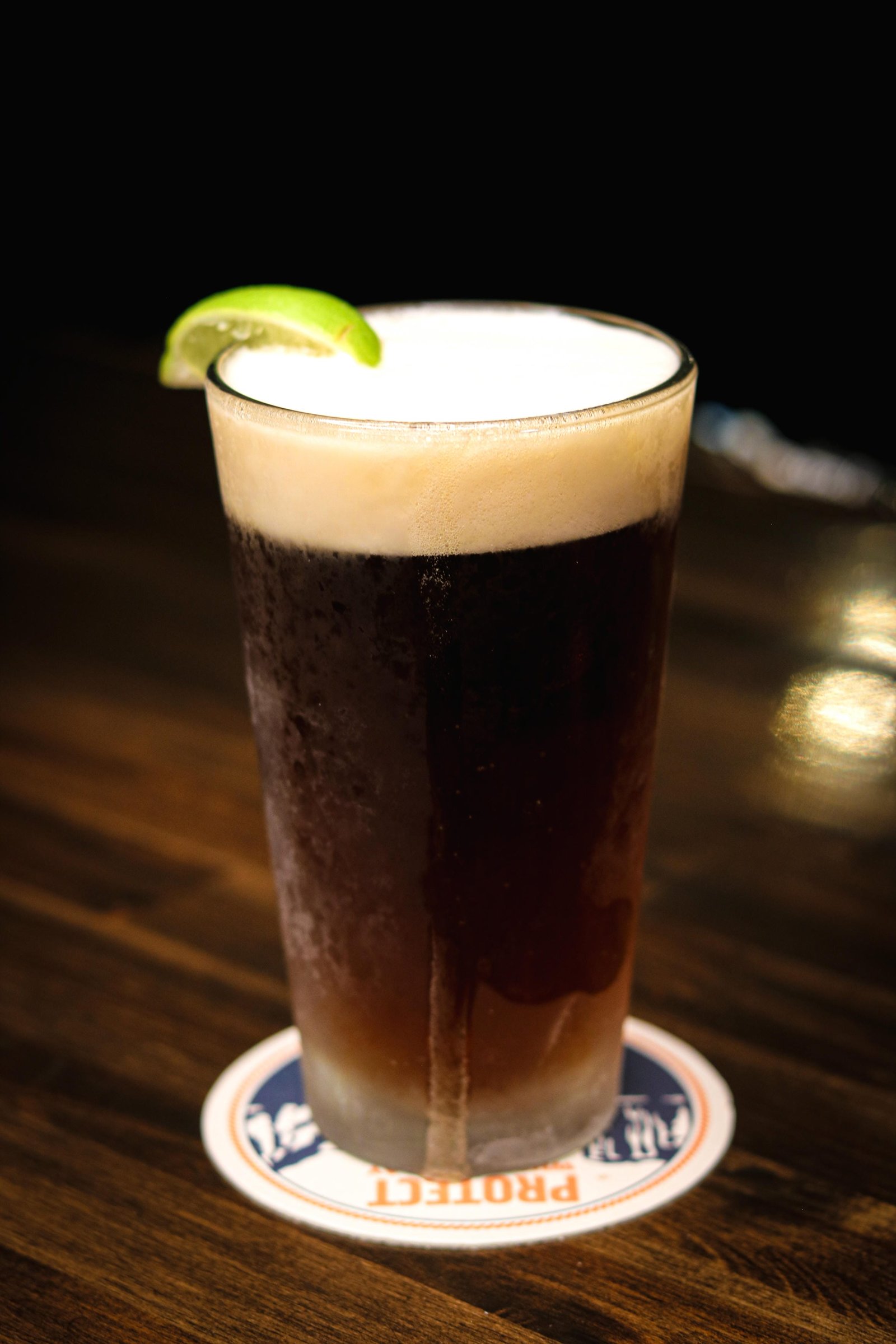 Draft beer in a tall glass at Tequila Fuego bar happy hour, Longview WA.