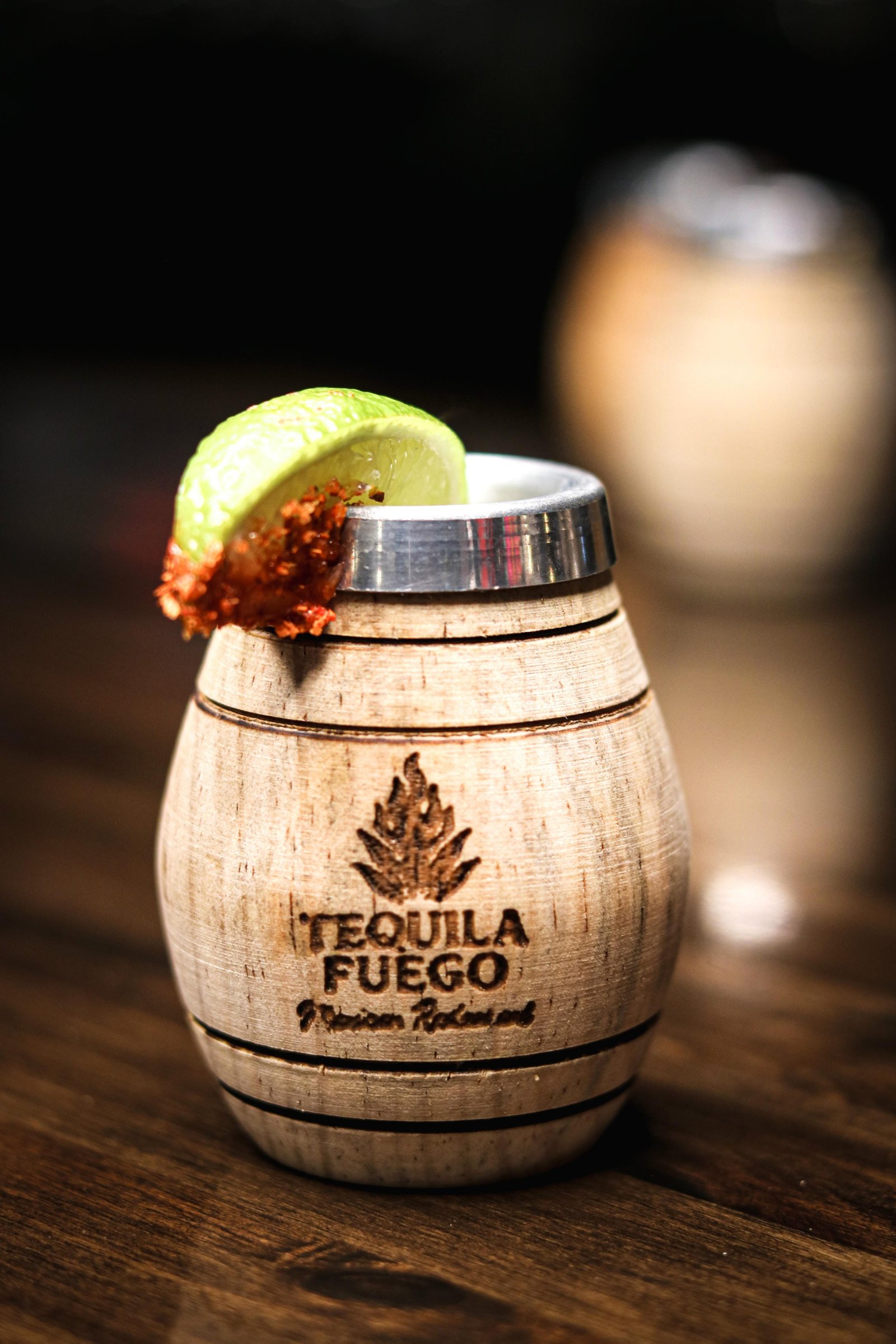 Mezcal or Sauza tequila shots in Tequila Fuego barrel shot glasses with lime, happy hour Longview WA.